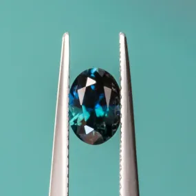 0.87CT OVAL NIGERIAN SAPPHIRE, DEEP OCEAN BLUE, 6.93X4.98X4.98MM, UNTREATED